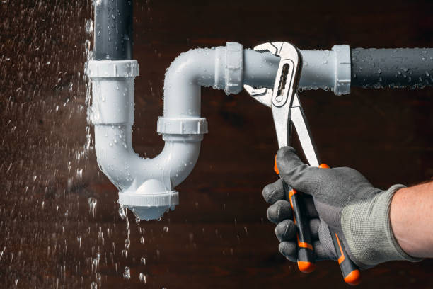 Professional Emergency Plumber technician working in Forsyth, IL